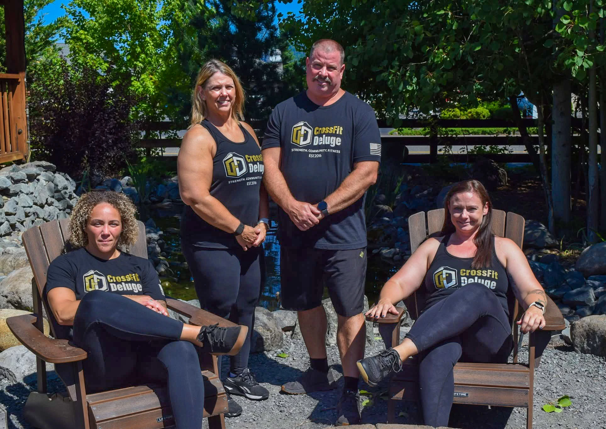 CrossFit Deluge coaching team - Jake, Christine, Corena, and Trisha