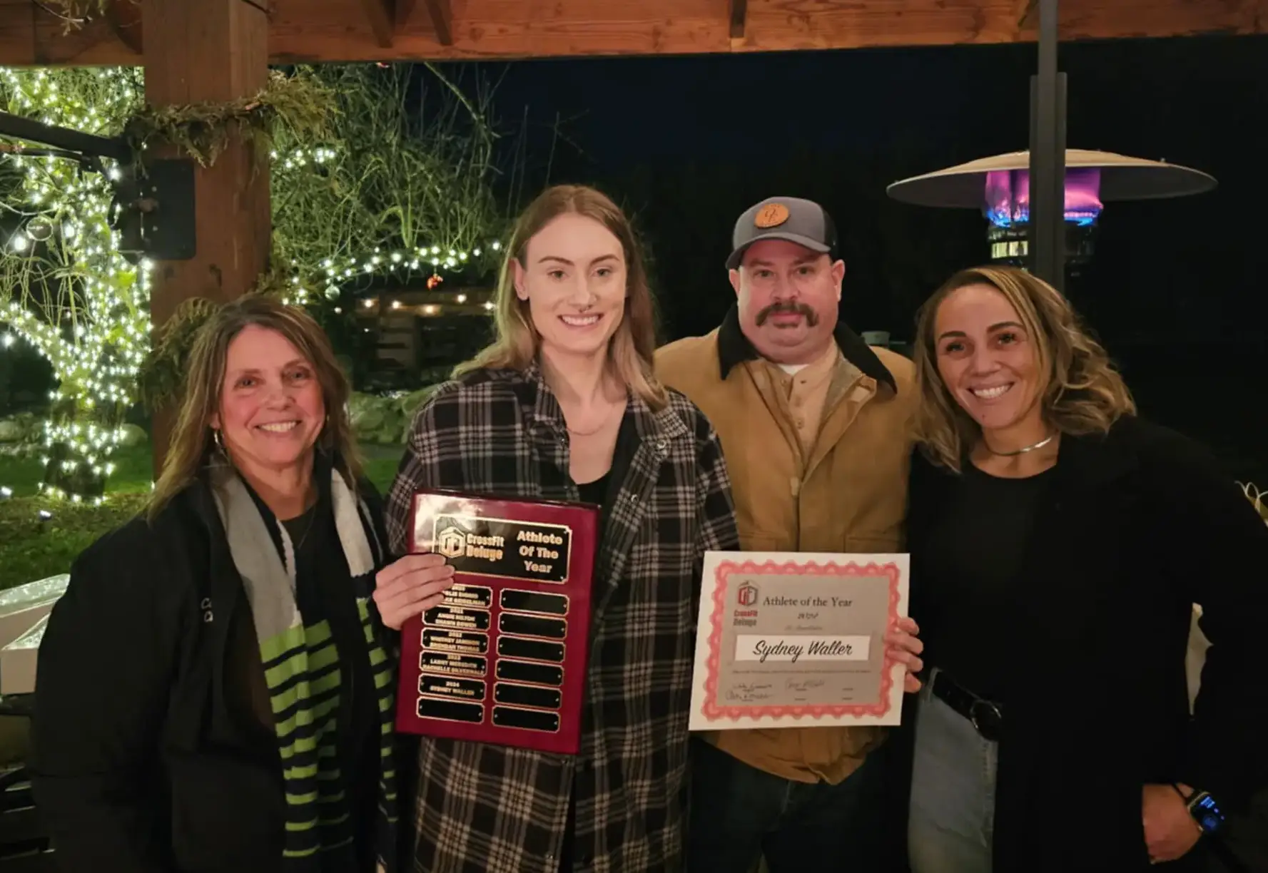 CrossFit Deluge members celebrating achievements and personal records with excitement and pride