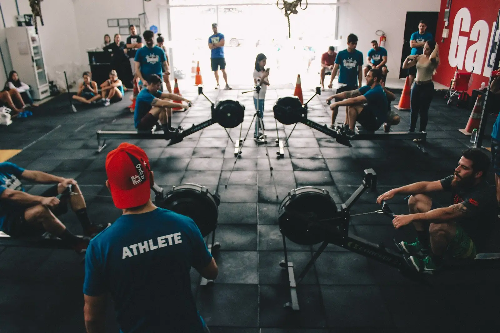 High-energy CrossFit workout in progress with athletes performing functional movements